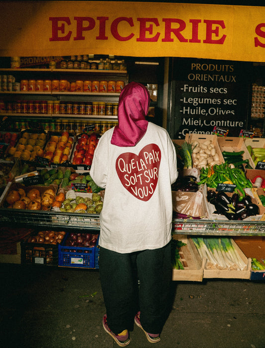 T-shirt oversize asymétrique “Que la paix soit sur vous” – Blanc crème